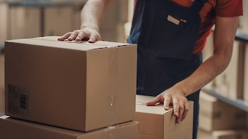 adobestock customer with boxes.350x0 is How can packaging increase your sales capacity and profits during peak season?