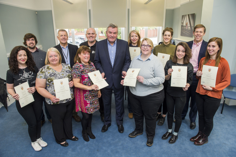 ken smith mike allen and neil jowsey present certificates to hull cof c team Arco leads health and safety training for Hull City of Culture