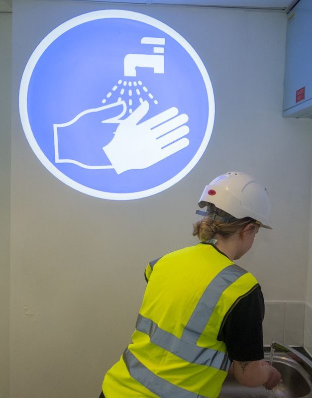 Food and drink companies improving safety with projected signage